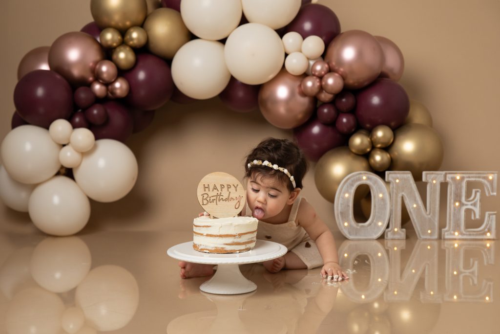 Cute baby eating cake