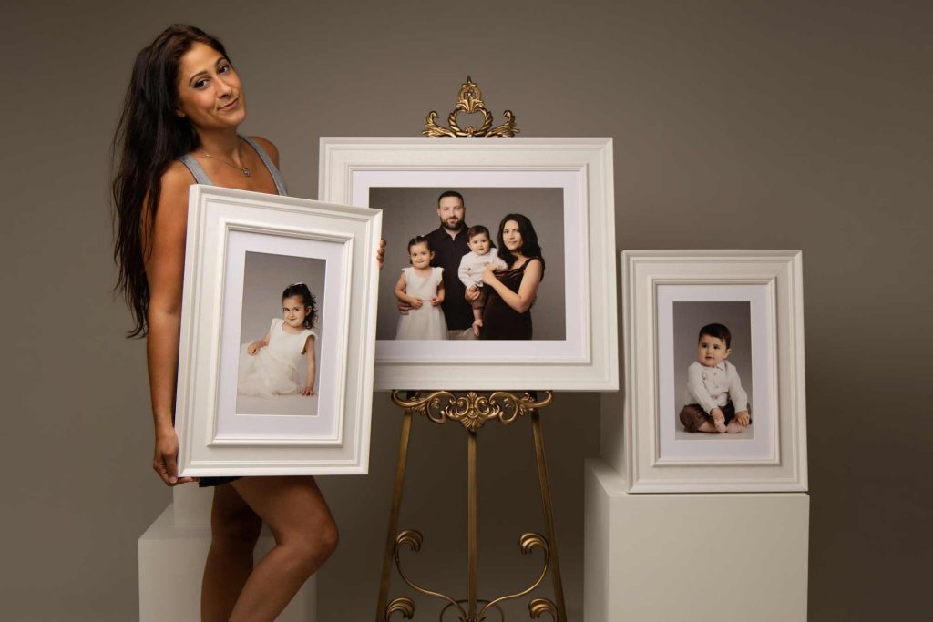 Photographer holding frames